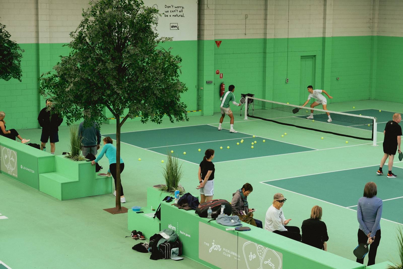 Players and spectators courtside at South Melbourne