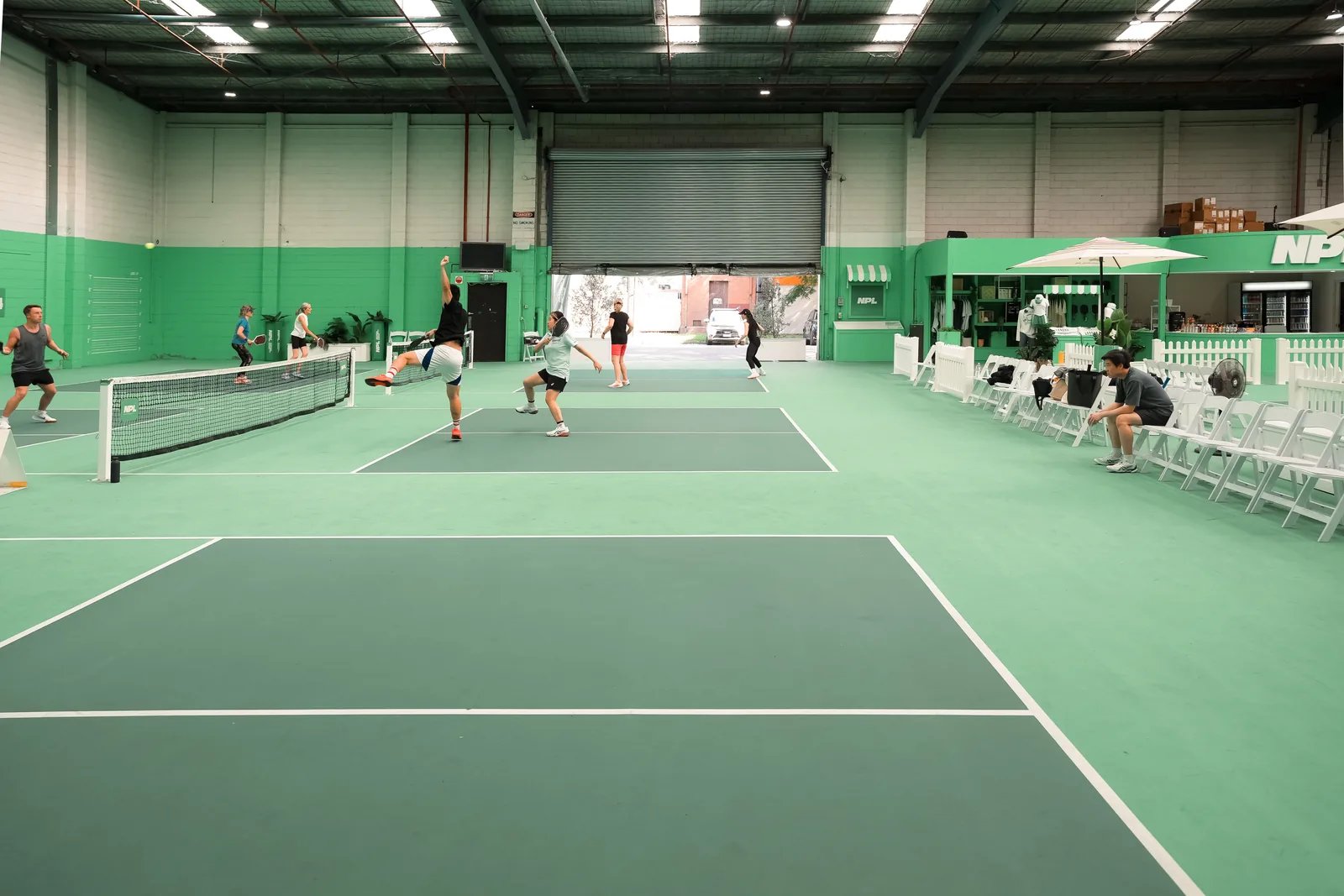 Daytime pickleball across the indoor courts at The Jar South Melbourne
