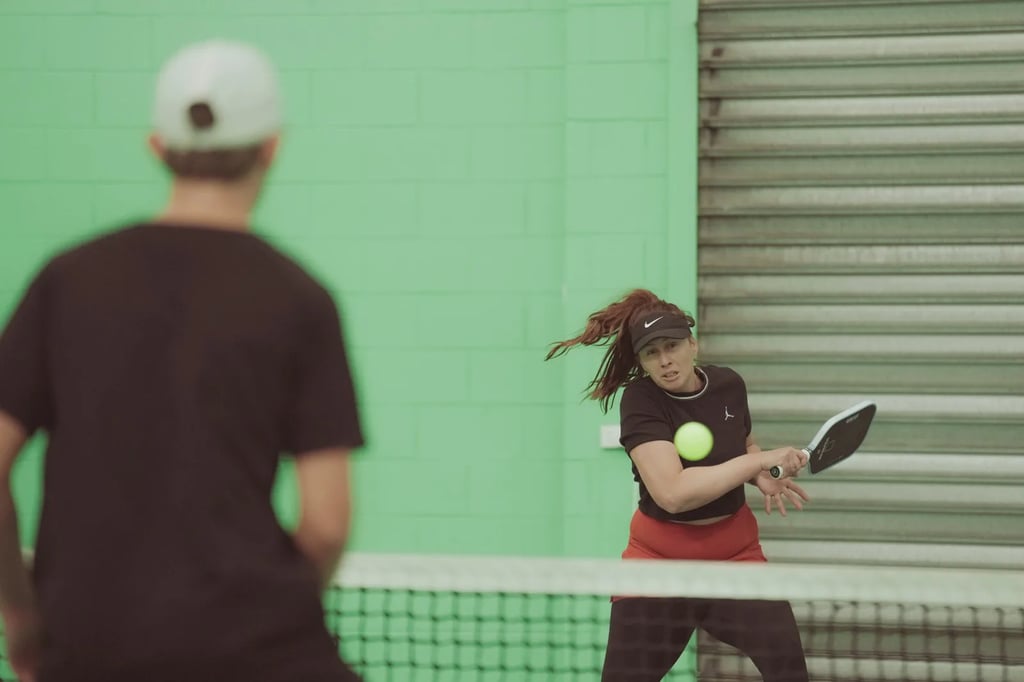 A player practising a backhand during Skills and Drills at The Jar South Melbourne