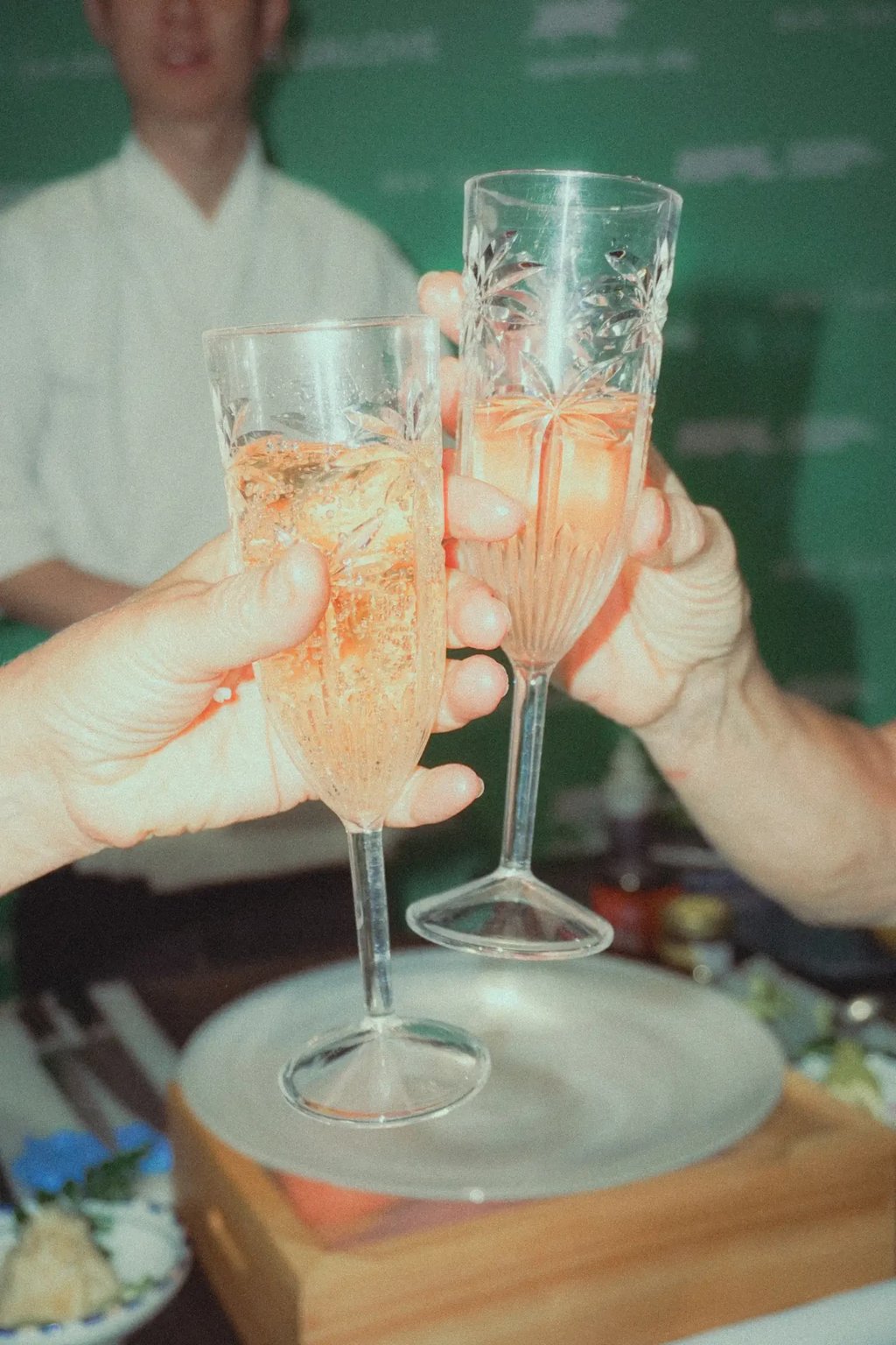 Two glasses of prosecco raised in a toast during Pickle and Prosecco at The Jar South Melbourne