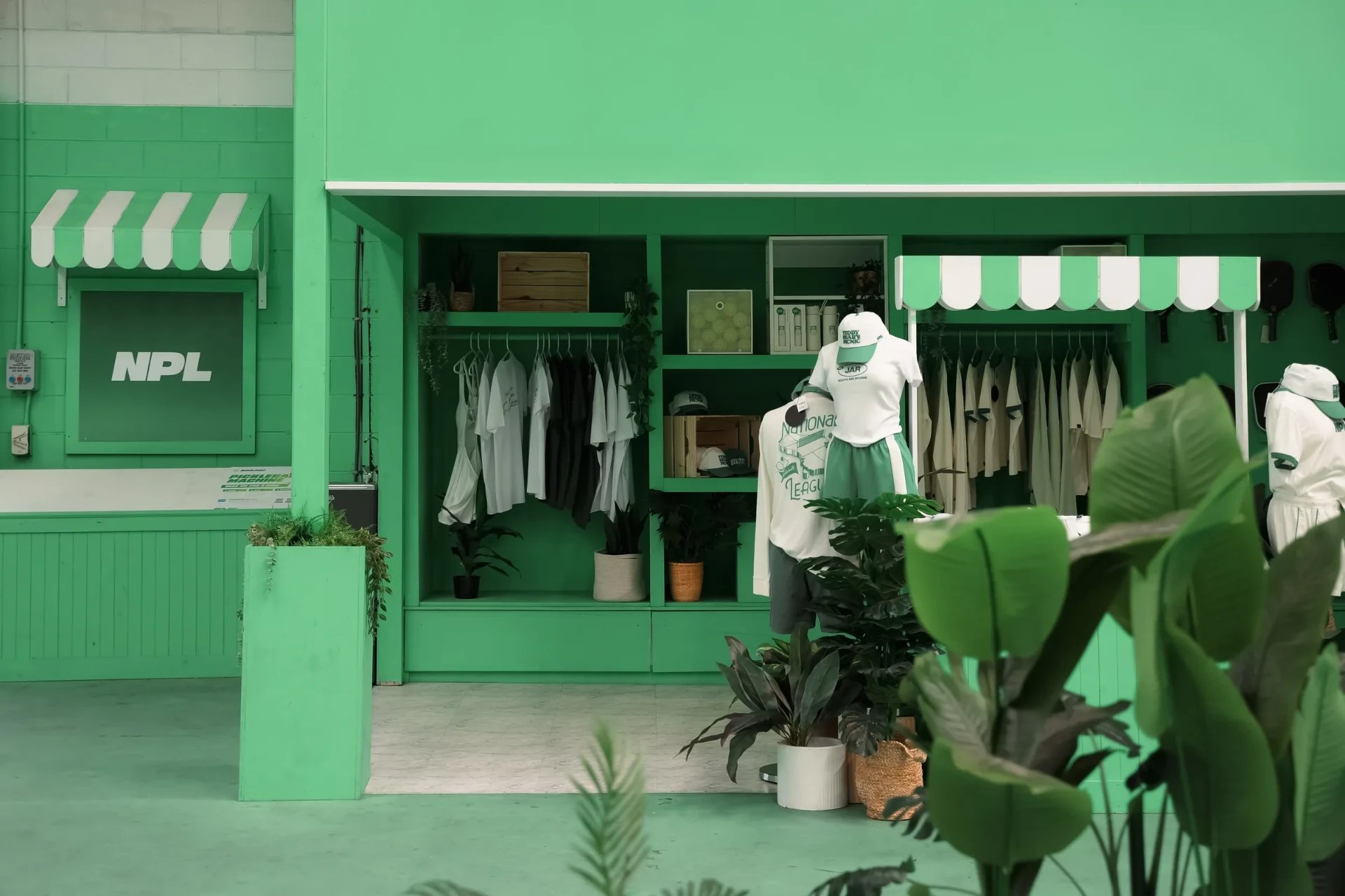 The green courtside pro shop at The Jar South Melbourne