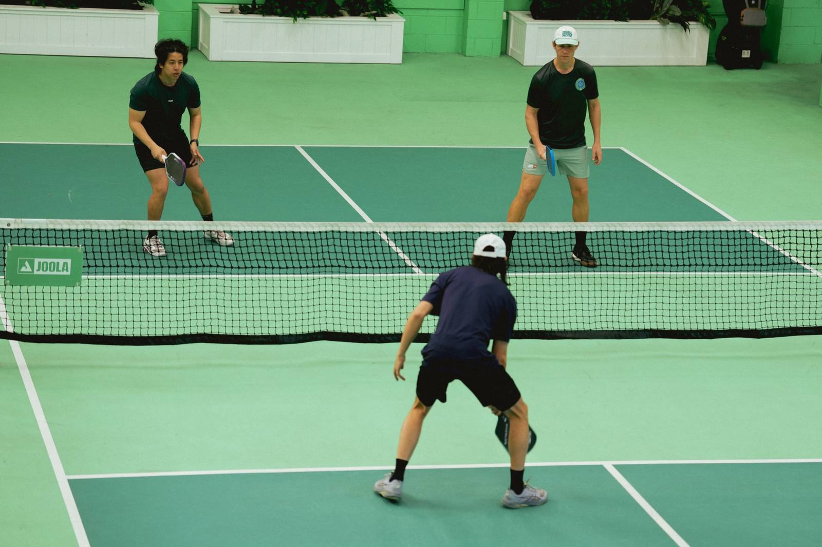 A doubles game at the net at South Melbourne